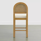 Sgabello da bancone Boho in rattan Spruce&Spring con schienale curvo in rattan e seduta imbottita
