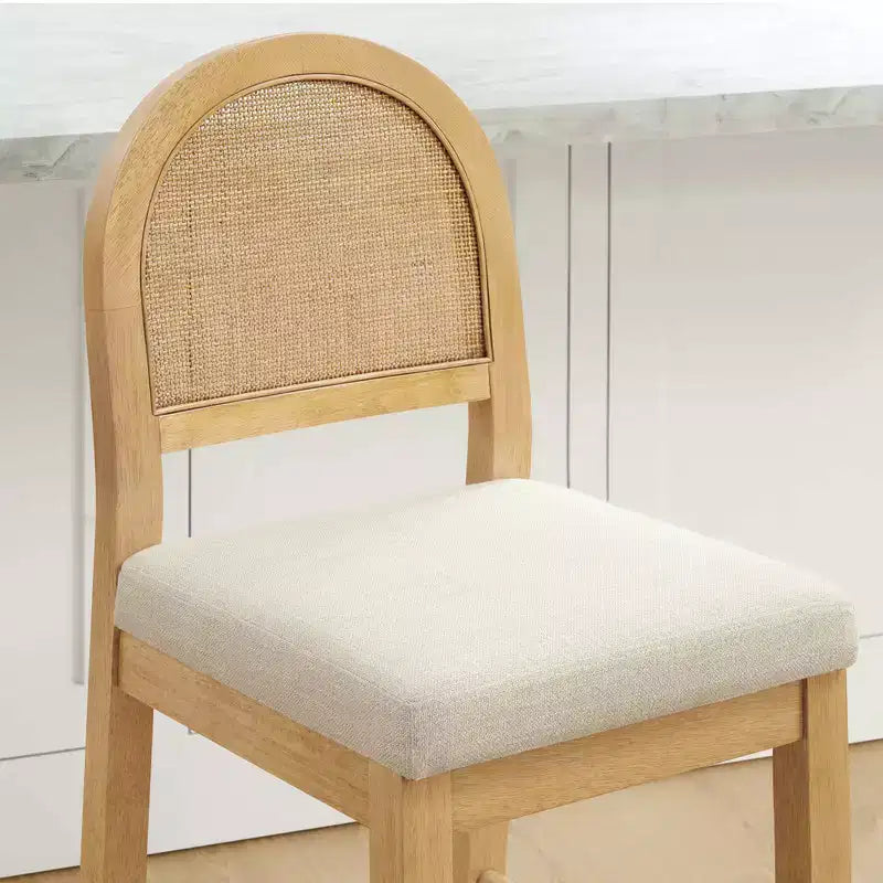 Sgabello da bancone Boho in rattan Spruce&Spring con schienale curvo in rattan e seduta imbottita