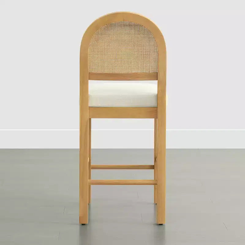 Sgabello da bancone Boho in rattan Spruce&Spring con schienale curvo in rattan e seduta imbottita