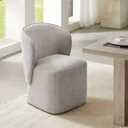 Sedia da pranzo moderna Spruce&Spring con rotelle e schienale avvolgente
