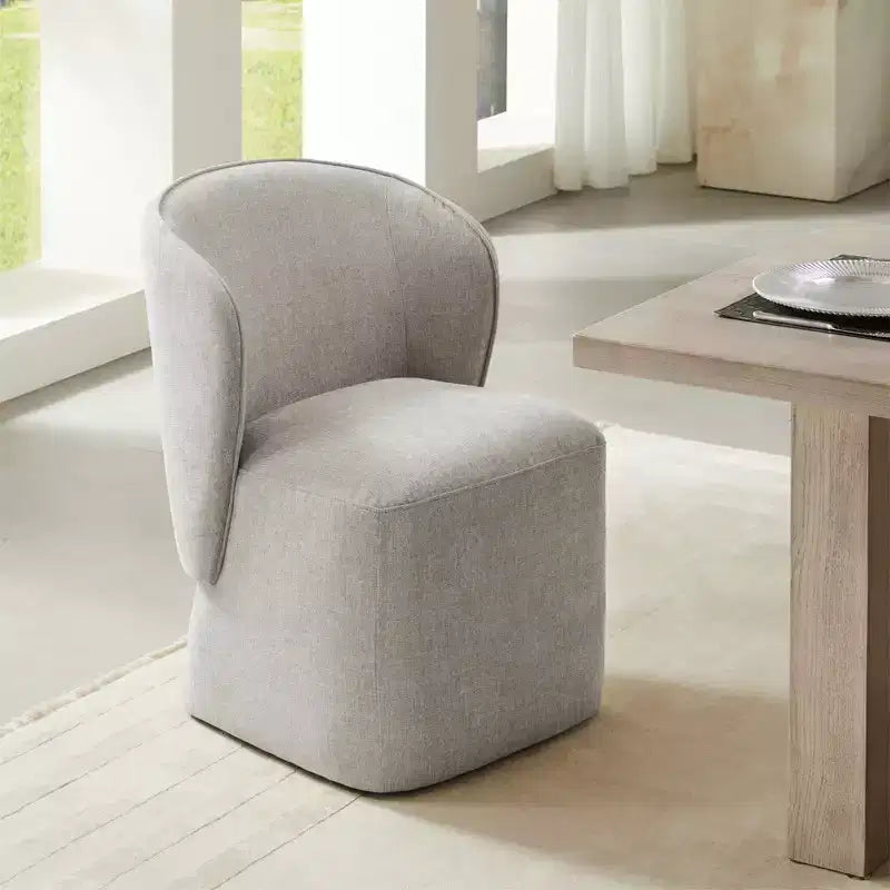 Sedia da pranzo moderna Spruce&Spring con rotelle e schienale avvolgente